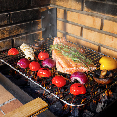 Insert charbon de bois cuisson grill installé dans barbecue béton fixe Insert charbon de bois cuisson grill installé dans barbecue béton fixe